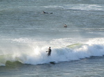 SX21455 Surfers at Manobier bay.jpg